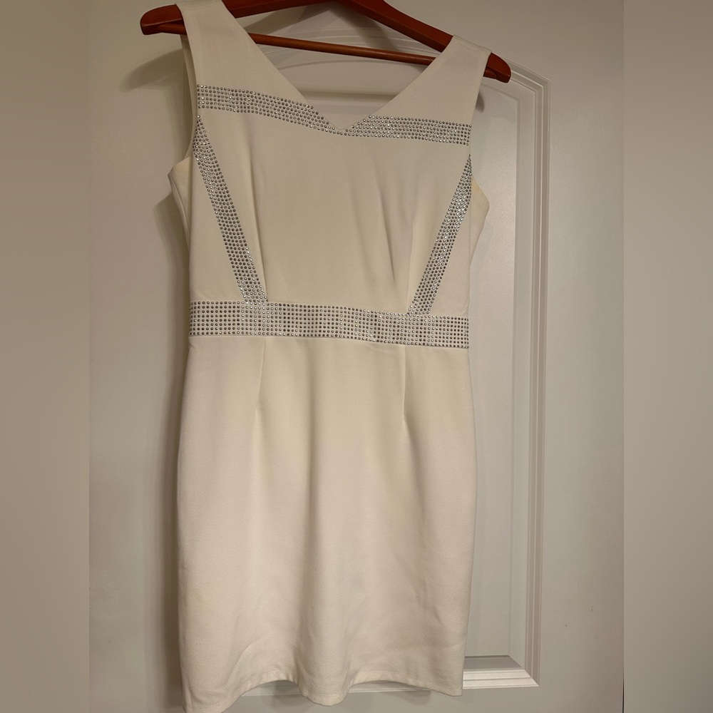 Sleeveless dress with stone detailing